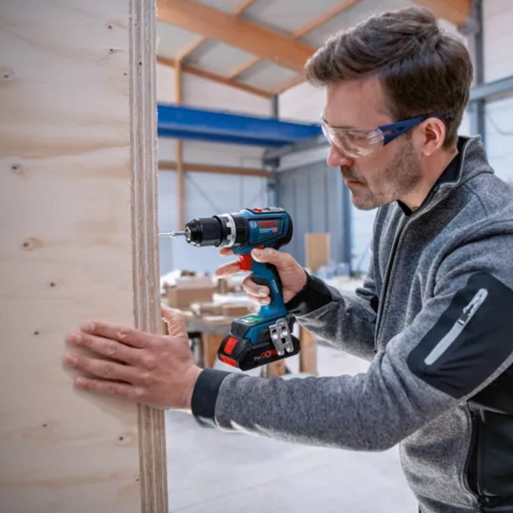 Trapano Con Percussione A Batteria Bosch GSB 18V-90 C Professional 18 V + 2 batterie PROcore da 4.0Ah + Caricabatterie + Valigetta L-BOXX - 06019K6105